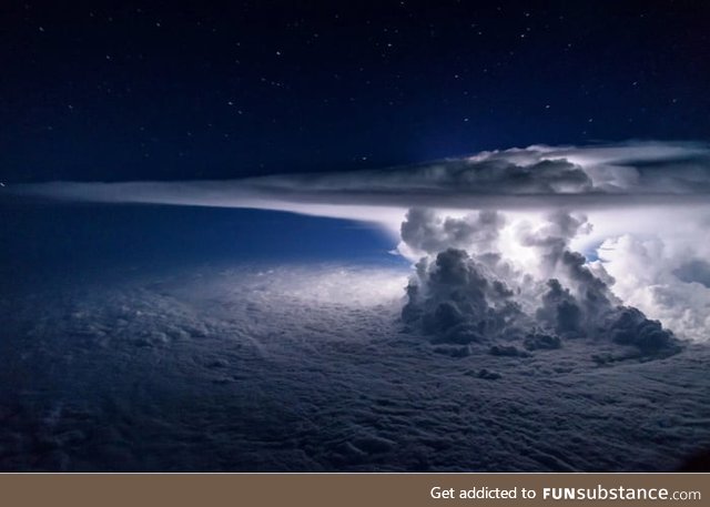 This picture of a thunderstorm at night over the Pacific ocean was taken at 37,000 feet