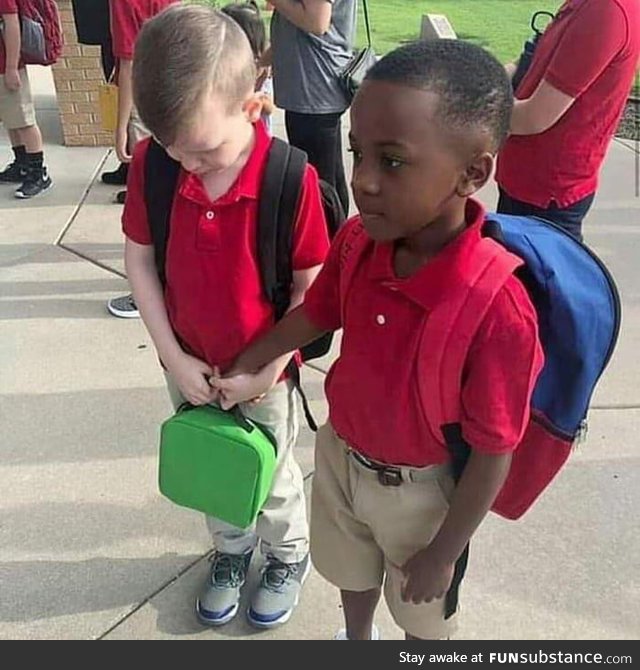 8-year-old helping overwhelmed classmate with autism on first day of school