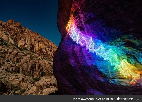 This rainbow path I created by taking a long exposure photpograph of myslef rock climbing