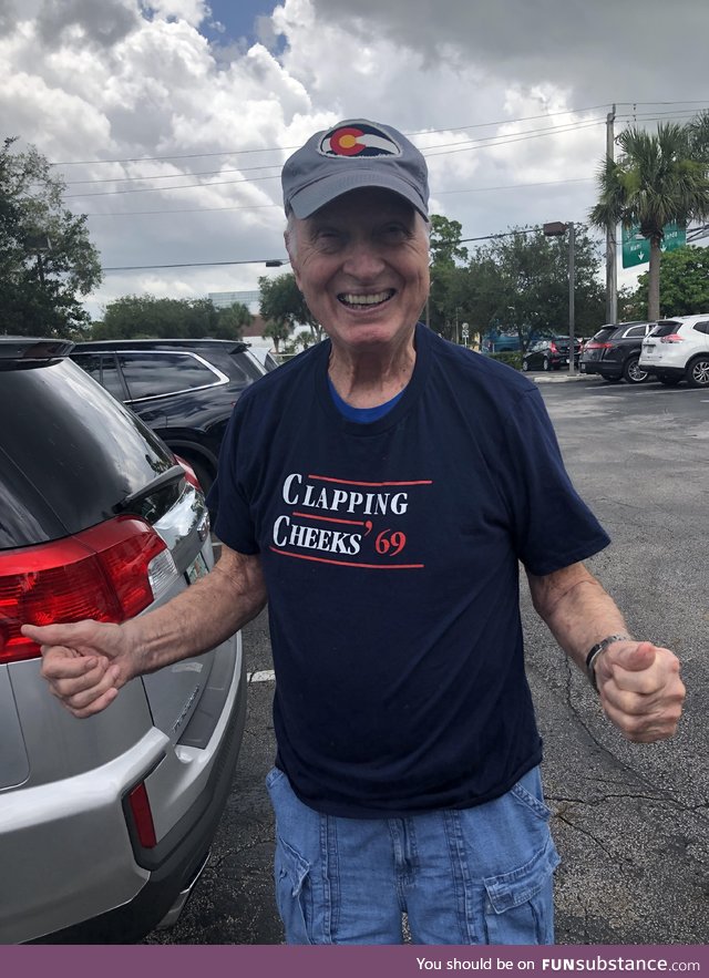 Grandpa wearing his new Goodwill shirt with pride