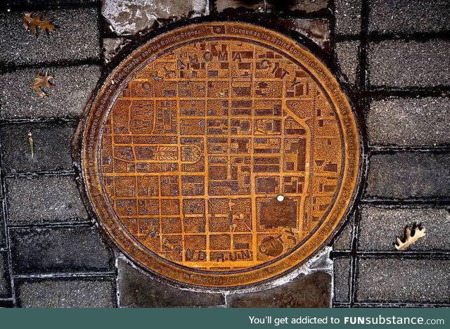 Oklahoma Manhole Covers have a city map on it with a white dot showing where in the city