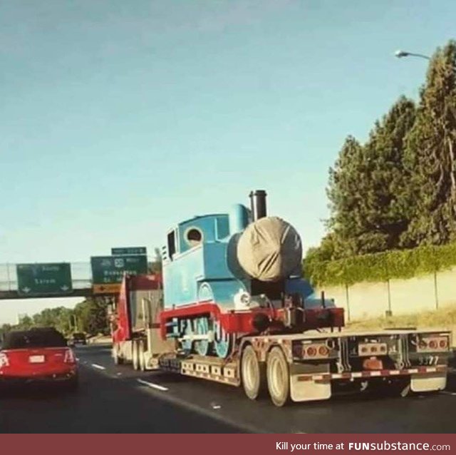 I believe I just witnessed Thomas The Tank Engine being kidnapped by Optimus Prime