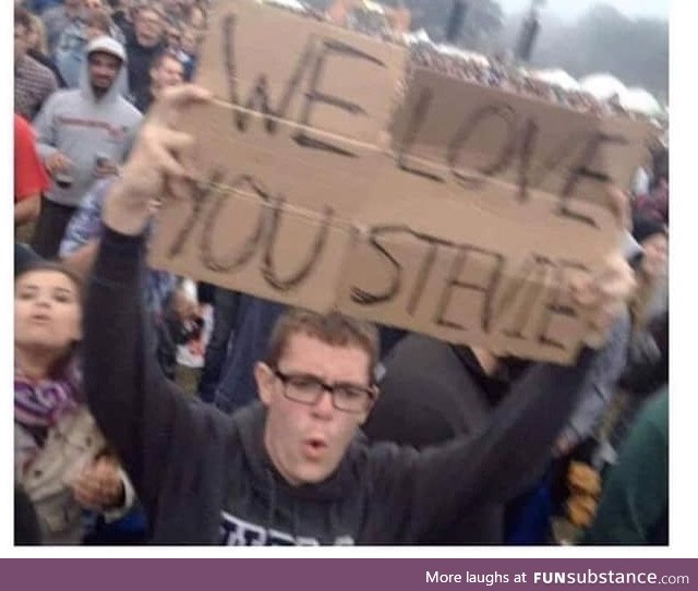 Never forget the guy who brought a sign to a Stevie Wonder concert