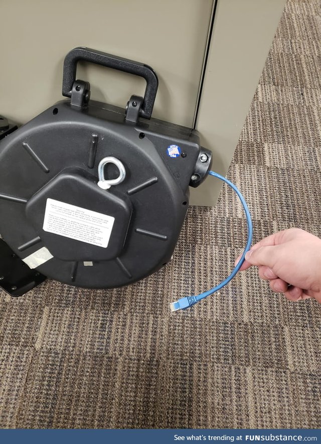 One of the madlad electricians at work made a 150 foot retractable ethernet cable