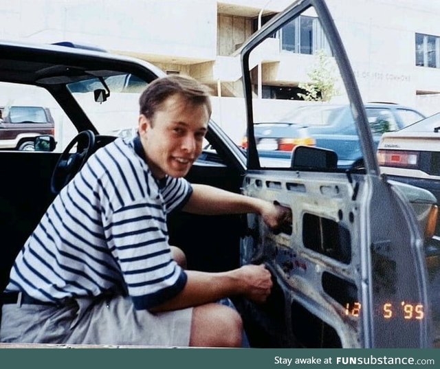 This is Elon Musk in '95 working on their BMW because they couldn't afford to