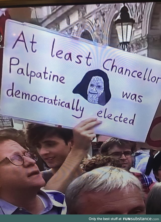 One of the signs at the protests against Boris Johnson in the UK