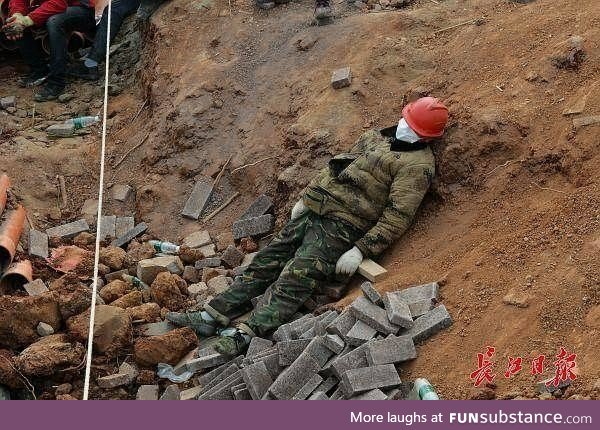 A Chinese worker on the construction site for Huo Shen Shan hospital, finished in 9 days