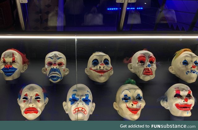 Authentic clown robbery masks from 'The Dark Knight.' On display at a DC Comics exhibit