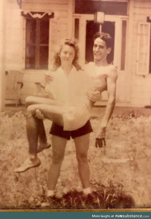 My grandmother holding my grandfather after Iwo Jima. Beaufort, SC
