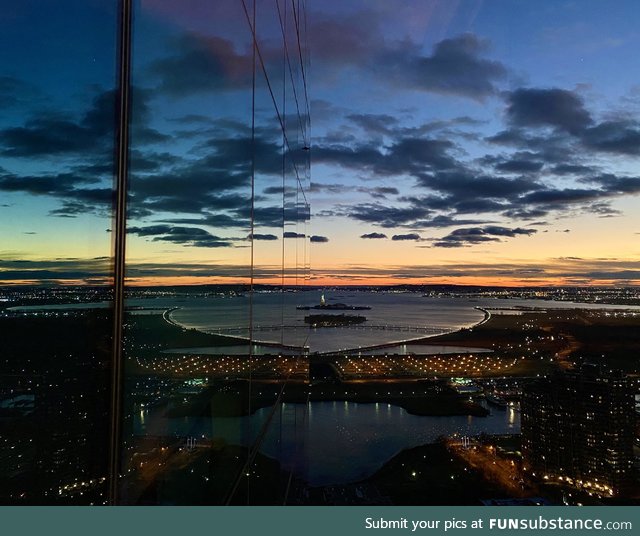 Pic from the 46th floor of a building in Jersey City. The Statue of Liberty is visible in