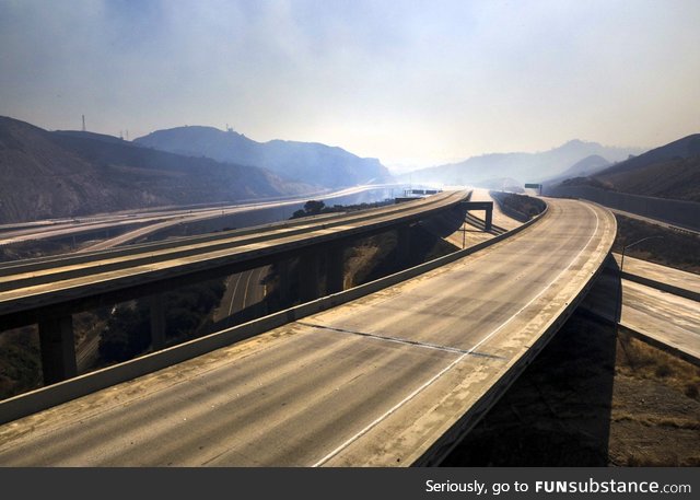 Eerie photo of empty Los Angeles freeways today due to the ongoing Saddleridge fires