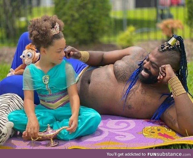 My buddy cosplaying Jasmine and the Genie with his daughter