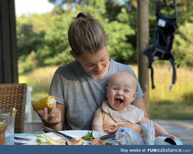 My daughter 0.1 seconds after trying corn for the first time