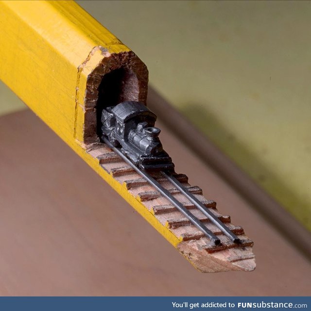 This carving of a train in a pencil 