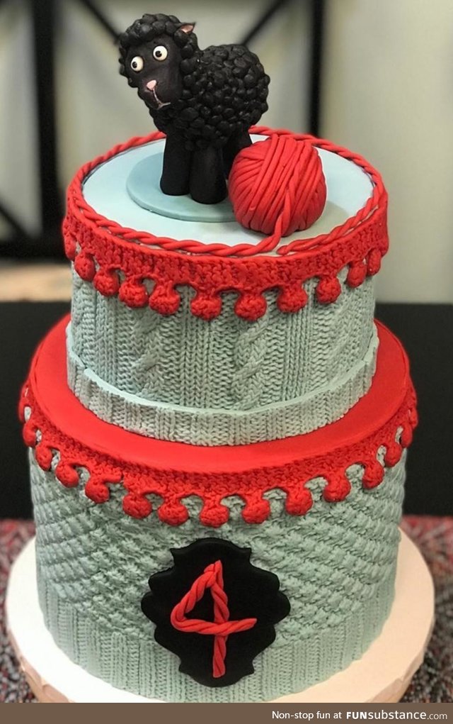 This is a CAKE! My wife made this by molding fondant to a knit pattern for the 4-year