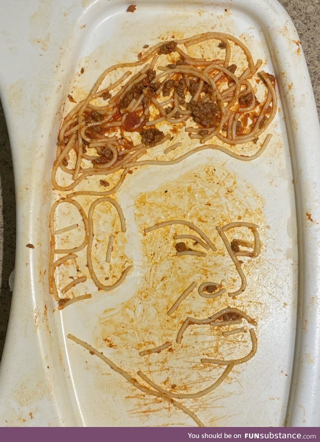 Portrait made from extra spaghetti. The sauce made for the perfect “skin” tone