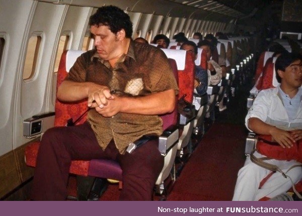 Andre the Giant in economy class