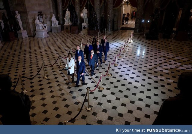 House managers chosen by Speaker Nancy Pelosi walk across Capitol Hill to deliver the
