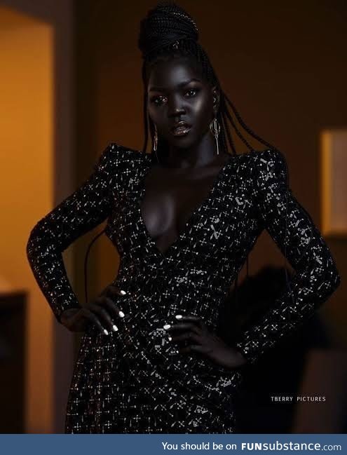 Nyakim Gatwech model with the darkest skin in the world. Just stunning!!!
