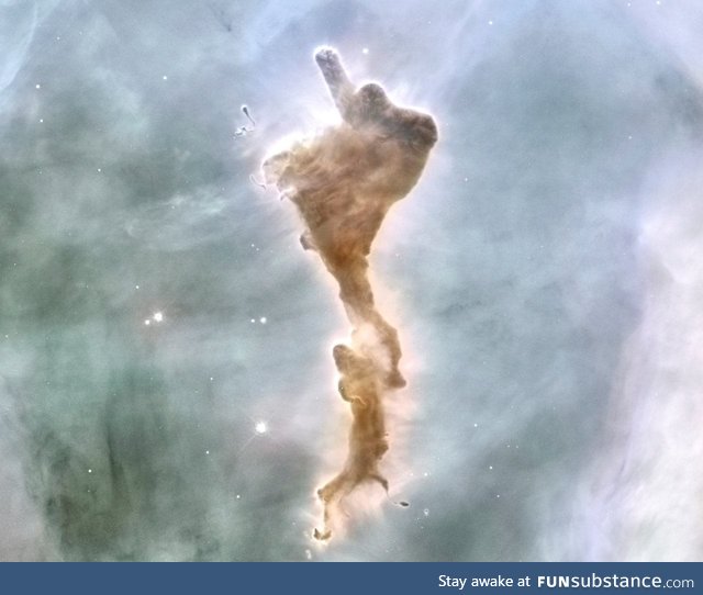 The "Finger of God" Within the Carina Nebula