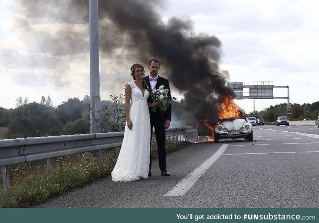 Newley wedded in front of their burning car