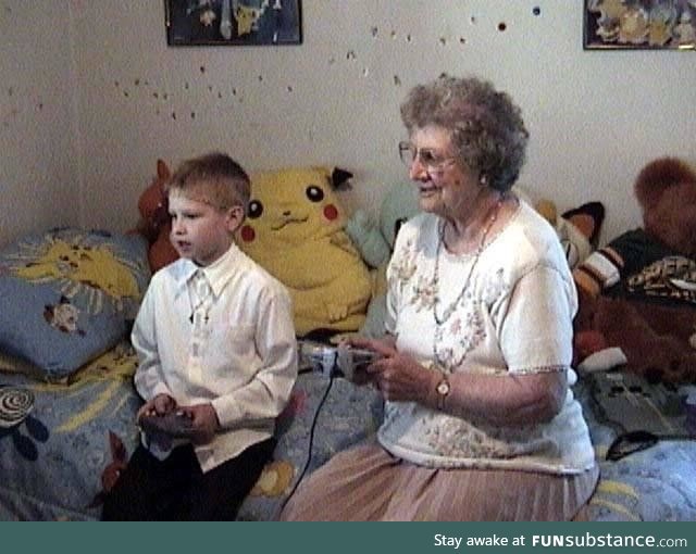 A 6 y/o playing Nintendo 64 with his grandma