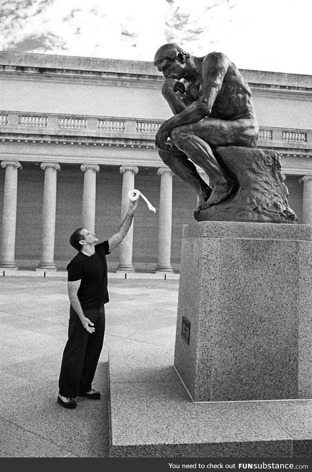 Robin Williams offering a toilet roll to The Thinker (early 90s)