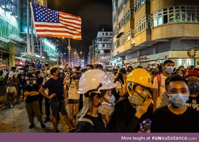 The American Flag flies at the Hong Kong protests. Hong Kong, this American supports you
