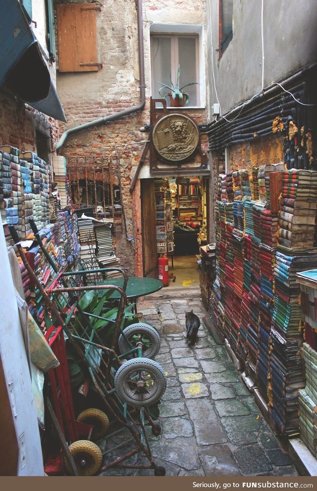 Old bookstore on a hidden street in Venice, the "Libreria Acqua Alta"