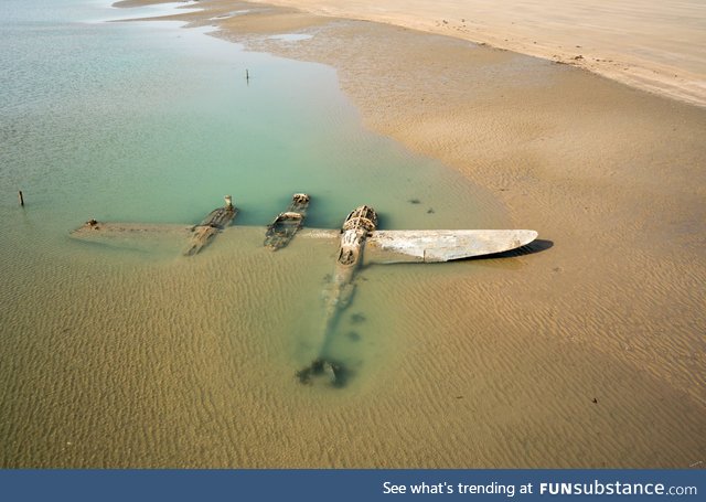 65 years after it crash-landed on a beach in Wales, an American P-38 fighter plane has
