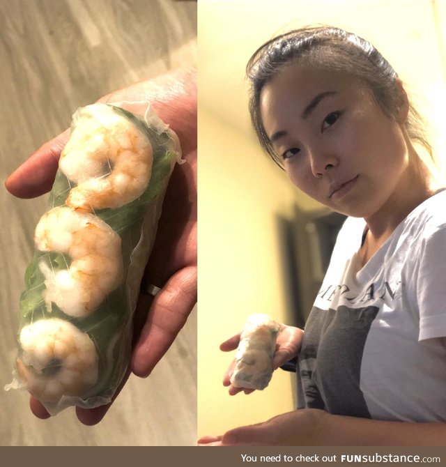My wife taking her spring roll wrapping skills way too seriously