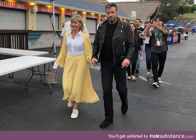 John Travolta and Olivia Newton-John reprise their roles for a Grease sing-along in