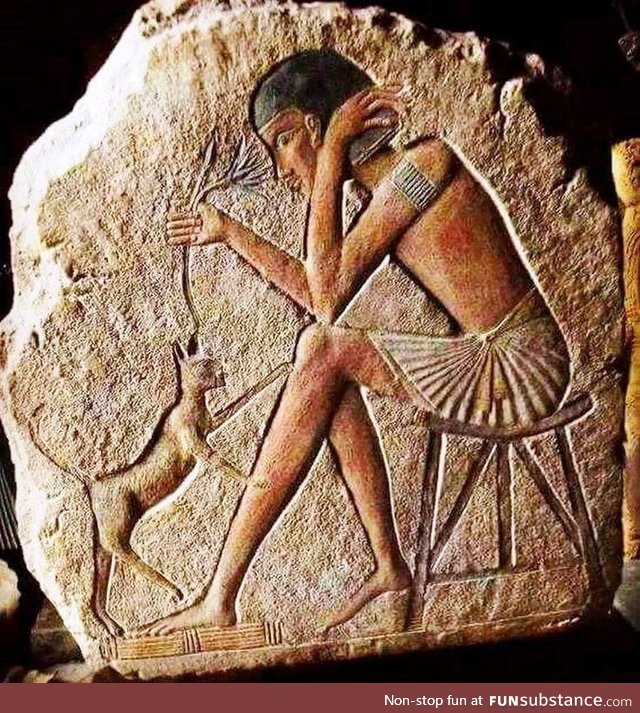 Fragment showing Egyptian playing with an gato