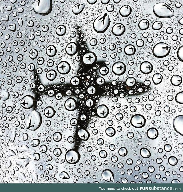 The way these water droplets reflect the plane the other way