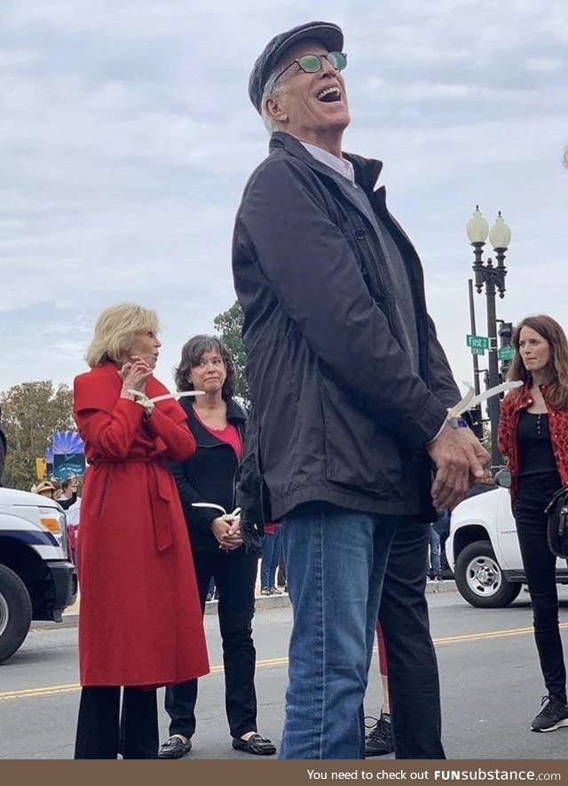 Ted Danson getting arrested during a protest