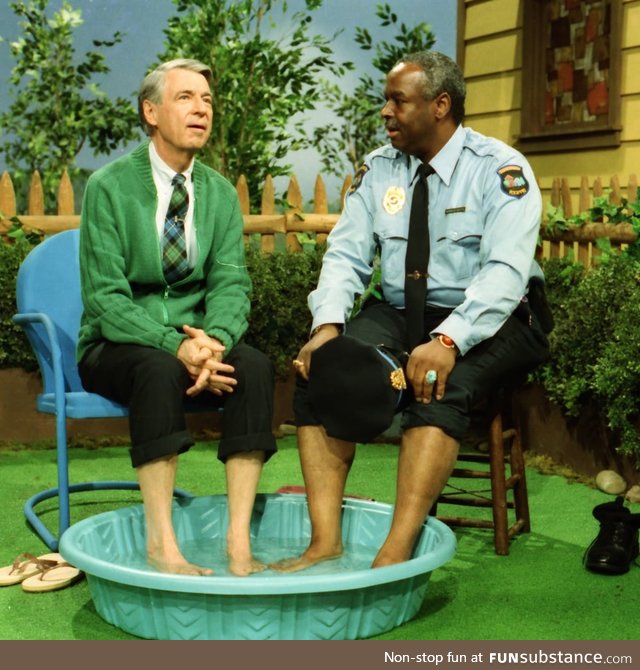 Mr Rogers breaking racial boundaries by sharing a pool with Officer François Clemmons