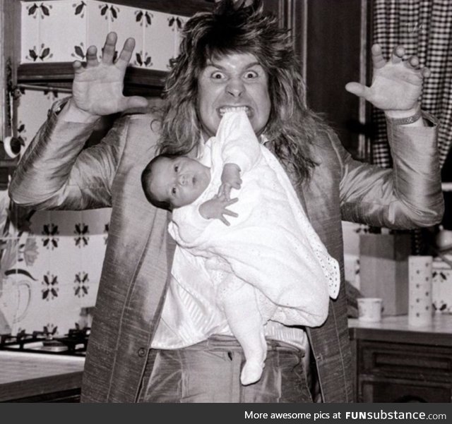Ozzy Osbourne pictured at home 2 weeks after the birth of his son Jack, 1985