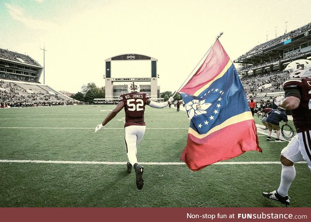 The Mississippi flag being run onto the field, 2002