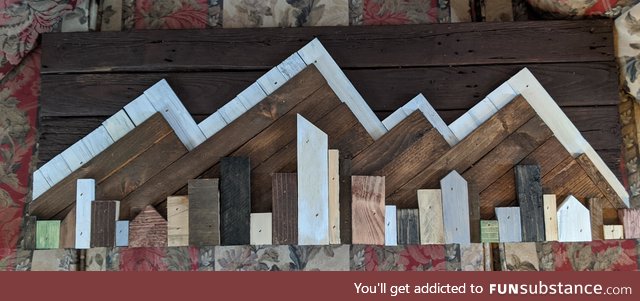 My dad made me this for Xmas. It's a Colorado skyline made from old wood pallets