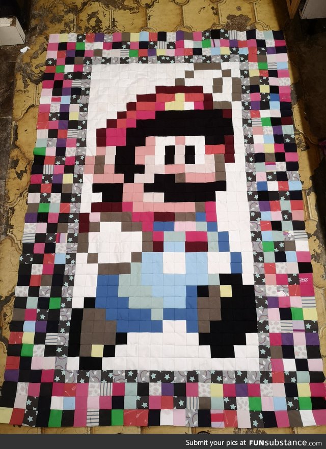 I made a quilt with 1014 two inch squares