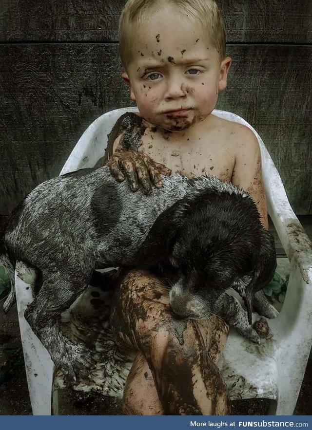 Just a boy and his hound dog puppy not ready for a bath. My son, Jude and his dog he