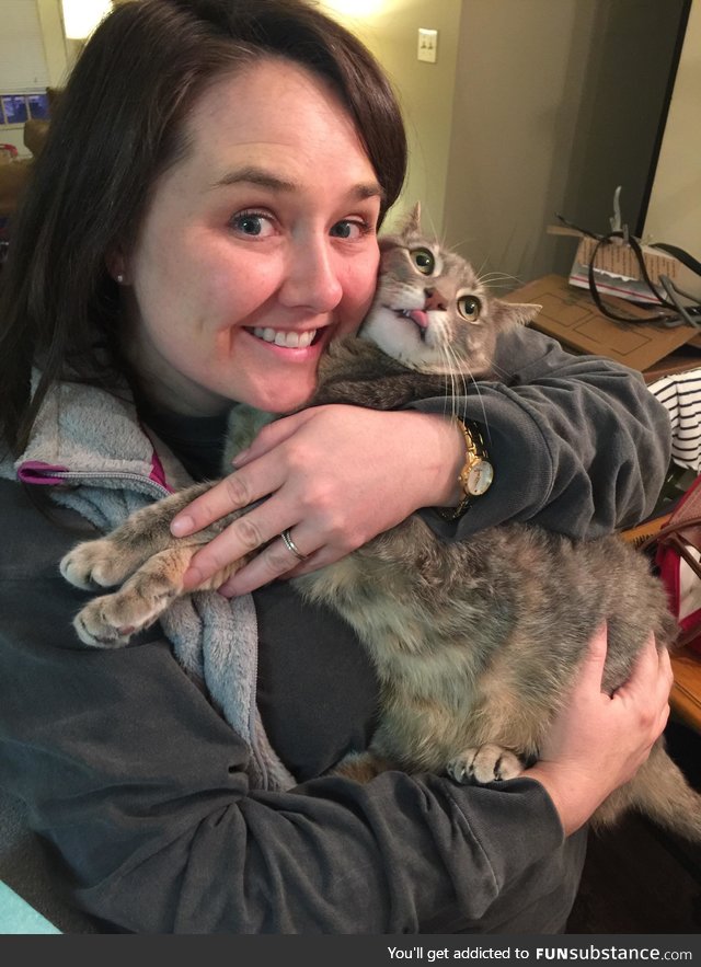 Our cat does this whenever she gets picked up