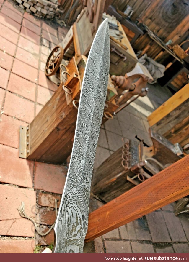 Hand forged Damascus sword