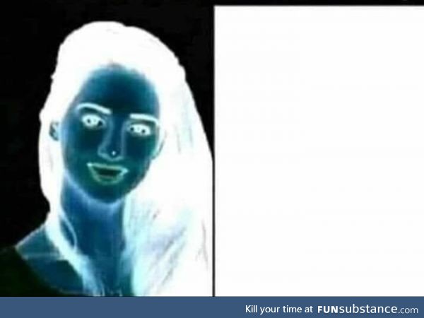 Look at the dot on her nose for 15 seconds & then look at the white screen to the
