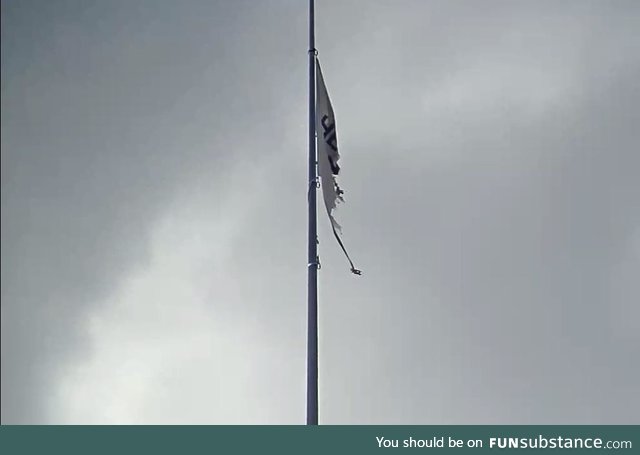 He will not divide flag is down once again
