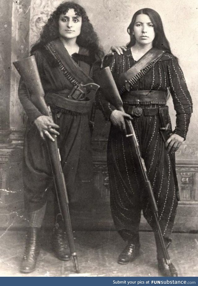 Two Armenian women pose with their rifles before going to battle against the Ottomans -