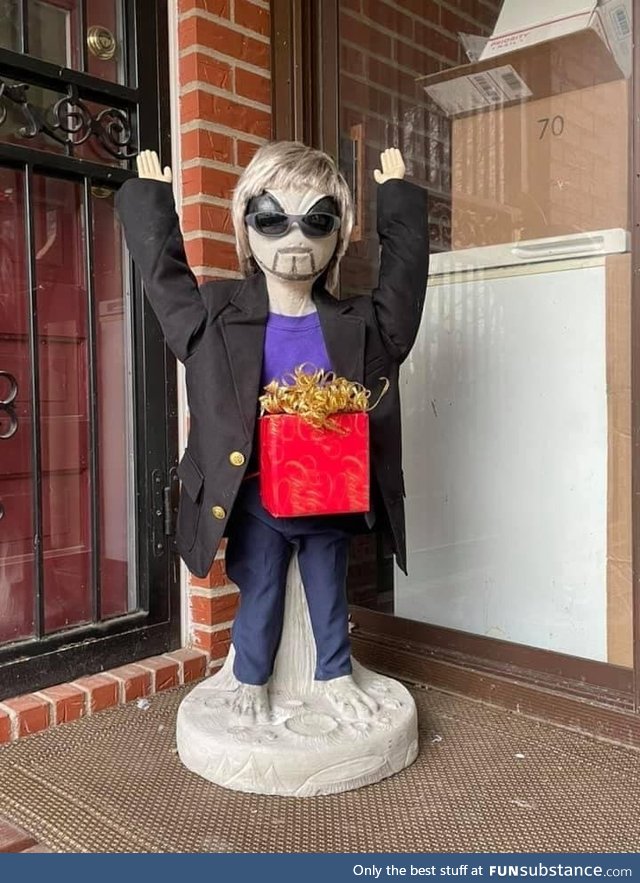 Every holiday my mom dresses her alien statue Paul in different outfits. She out did