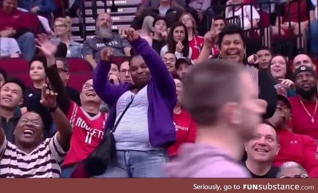 Twins dancing at the rockets game