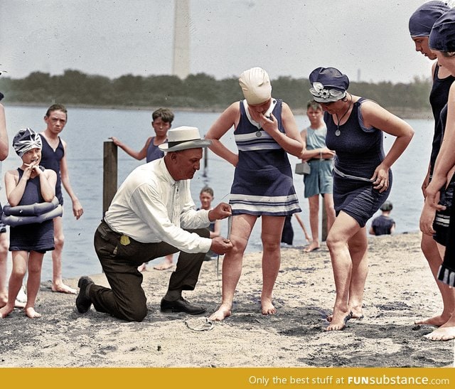 In 1922, swimsuit police would check the length of a suit (Colorized photo)