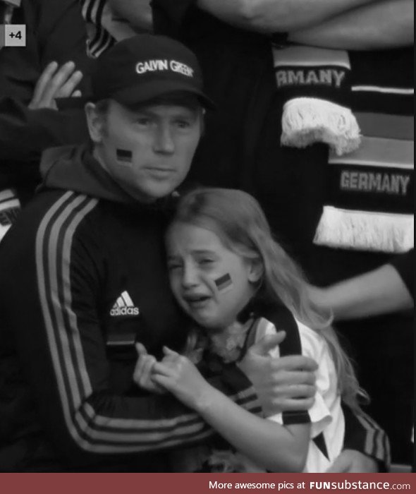 German Father comforts his daughter as they overlook the battle for the Rhine